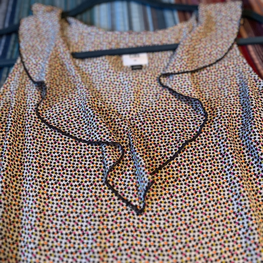 Cabi sleeveless blouse with ruffle. Size M